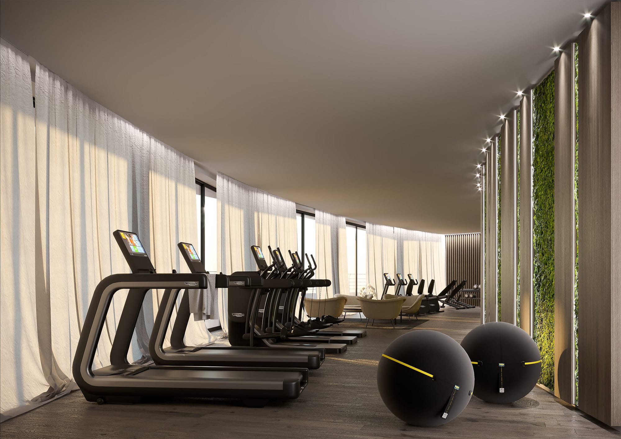Britannia Excelsior Hotel & Spa, area fitness con macchine cardio e parete verde